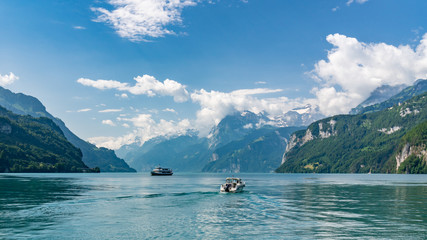 Switzerland, Panoramic view on green Alps and lake Lucerne with boats