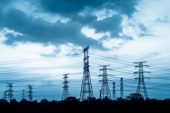 Electricity tower silhouette and sky landscape at dusk