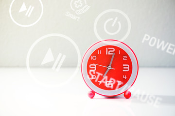 Red alarm clock overlay with button icon.