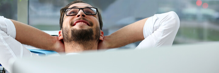 Handsome smiling bearded adult clerk person arms crossed
