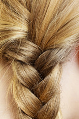 Close up of woman blonde braid hair hairstyle