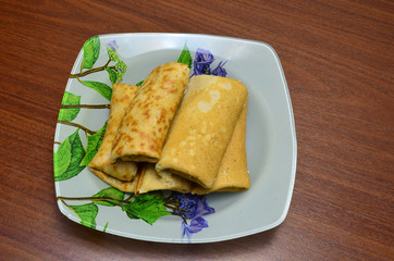 homemade pancakes stuffed lie on a dish