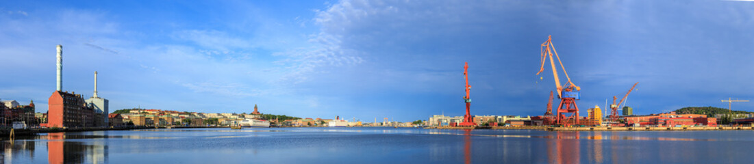 Gothenburg, Sweden. Gothenburg pier panorama. Harbor cranes, industrial zone and city center