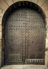 Old iron door in a medieval building