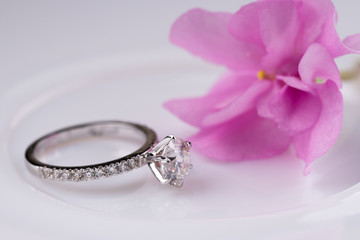 Diamond Ring and Pink Flower