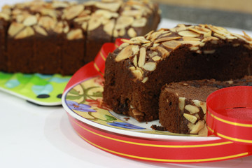 Fototapeta na wymiar Homemade Delicious Brownies With Almond And Ice Sugar