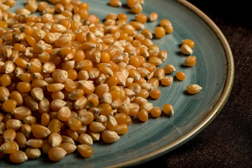 close photo Popcorn seeds on plate