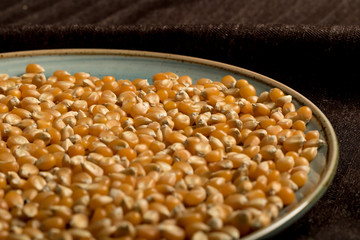 close photo Popcorn seeds on plate