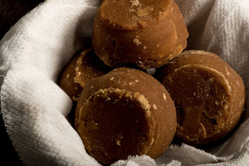 Colombian panela on basket and dark background