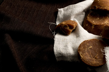 Colombian panela on basket and dark background