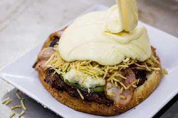 bacon burger, chopped potato and cheese