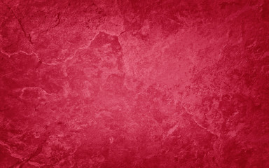 Red background with vintage grunge texture, old textured stone or rock wall in Christmas colors