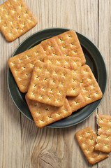 Square crackers on a plate