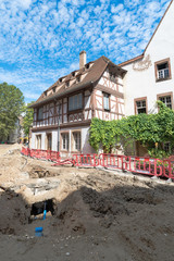 construction site in the Petite France neighborhood of Strasbourg with road works and medieval...