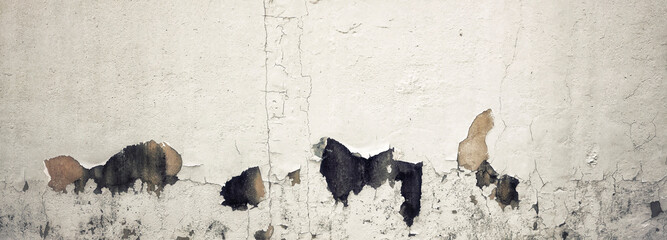 Old Wall with Moldy Peeling White Painting from Humidity. Cracked White Wall as Rusty Concrete Weathered Wall Grunge Background or Abstract Backdrop Wallpaper Vintage Texture Design Copy Space Text