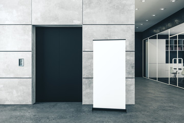 office interior with blank poster