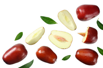 fresh date fruit with sleces and leaves isolated on white background. top view