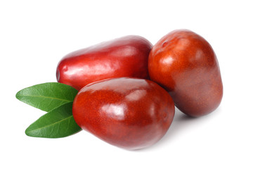 fresh date fruit with leaves isolated on white background.