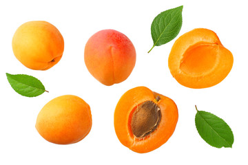 apricot fruits with slices and green leaf isolated on white background. top view