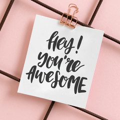 Hey you are awesome. Card with quote hanging on a mudboard