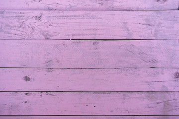 Pink wooden background texture.