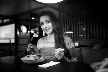 Girl in a cafe at a dinner