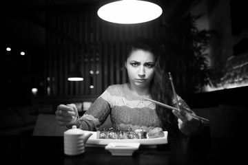 Girl in a cafe at a dinner