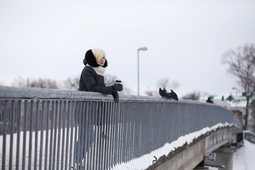 Young beautiful girls on a walk in winter