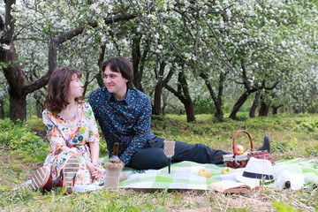 young couple on date in spring park