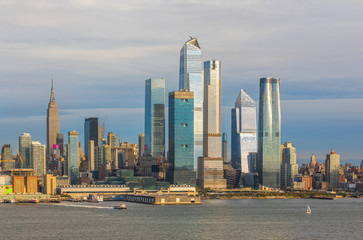 Fototapeta na wymiar Panoramic view to West Side of Manhattan Skyline from Hamilton Park, Weehawken, across Hudson River.