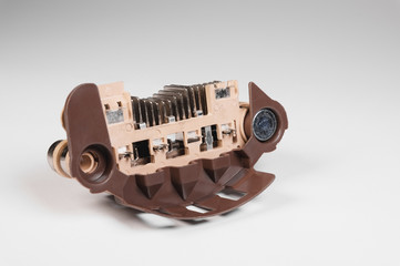 Close-up of a new relay regulator equalizing the voltage in the generator. New auto parts