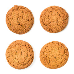 Homemade bakery. Set of four sweet cookies made from oatmeal flour. Tasty biscuit close-up isolated on white background. Homemade cookies.