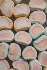 Colorful marshmallows candy as background. Close up view of fluffy candies. 