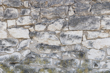 Textured background of large masonry natural stone large stone blocks. Stylish designer background