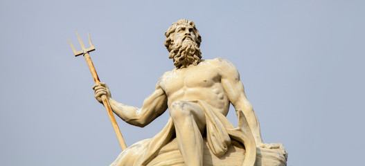 Ancient statue. God of seas and oceans Neptune (Poseidon).