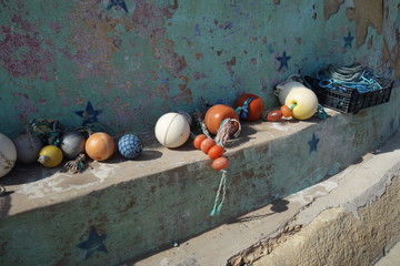 Summer scene: abandoned floats and buoys supplier