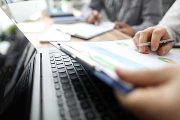 Group of people working with financial reports