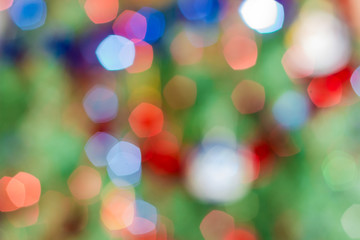 Abstract background of blurred Christmas lights on Christmas tree
