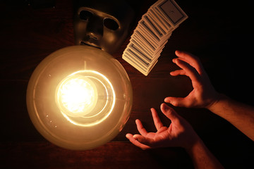 A sorcerer's table with a fortune-teller ball