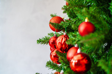 Beautiful Christmas tree with red baubles close up