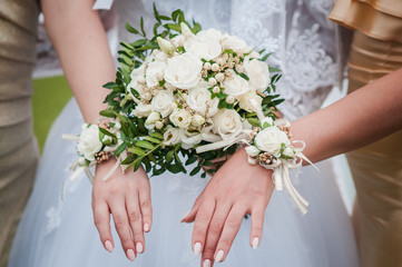 Bouquets of flowers in the hands of the bride and bridesmaids