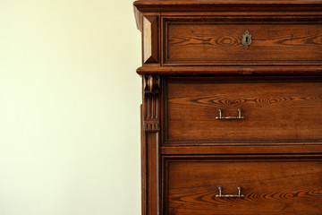 Old wooden chest of drawers close up