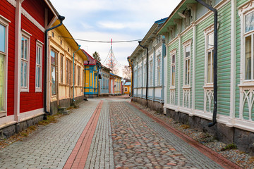 Fototapeta na wymiar The colorful Old City of Rauma, Finland is a UNESCO World Heritage Site and an excellent example of an old Nordic city constructed of wood.