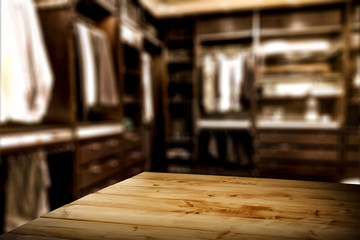 Nice interior of the wardrobe with wooden table top space for advertising products and decorations or text.