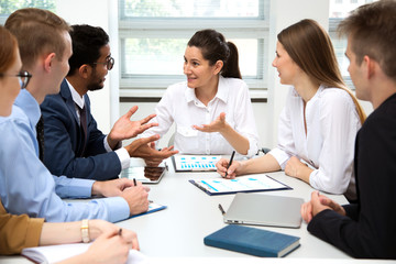 Fototapeta premium International business team discuss a new project