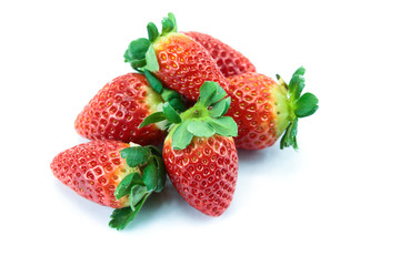 pile of strawberries on a white background
