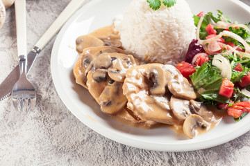 Chicken escalopes with champignion in creamy sauce