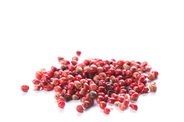 pink pepper grains isolated on white background with copy space for your text