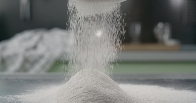 The flour is sifted through the sieve, making the dough, cooking pastry, baking preparations, 4k DCI 120fps Prores 422 HQ 10 bit