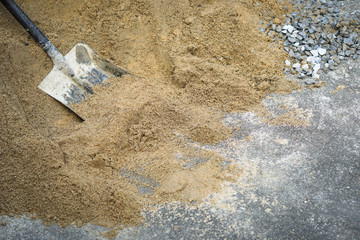 Shovel placed used for scoop sand in construction work. Sand and rock material for construction work